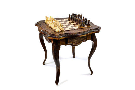 Close-up view of the handcrafted luxury chess table, showcasing intricate woodwork and elegant metal accents.
