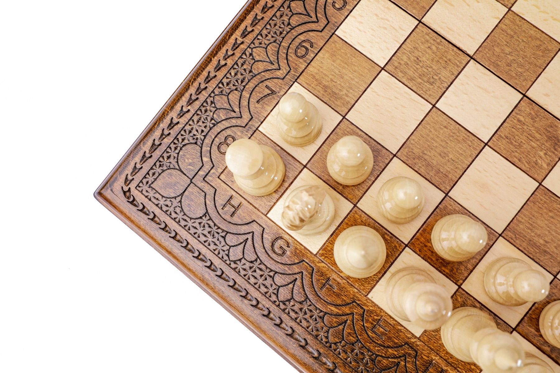 Command the board in style with a chess set that showcases the grandeur of classic chess through exquisite handcrafted detailing on wood.