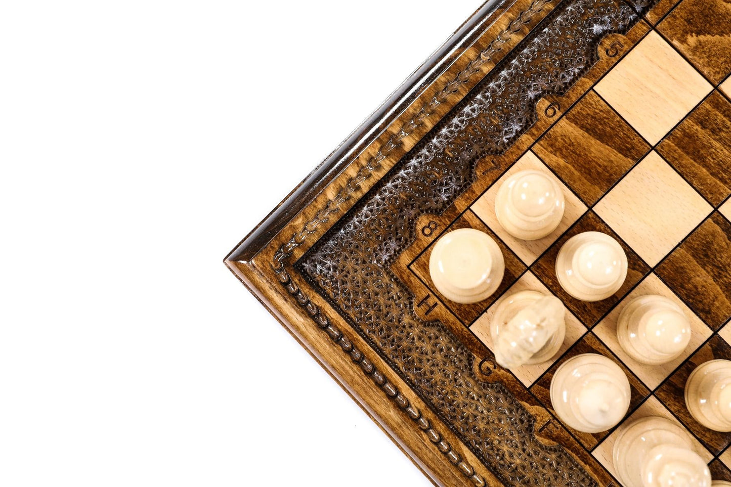 Engage in the art of strategy with a dual-purpose game set, where the craftsmanship of chess meets the excitement of backgammon in artisanal elegance.
