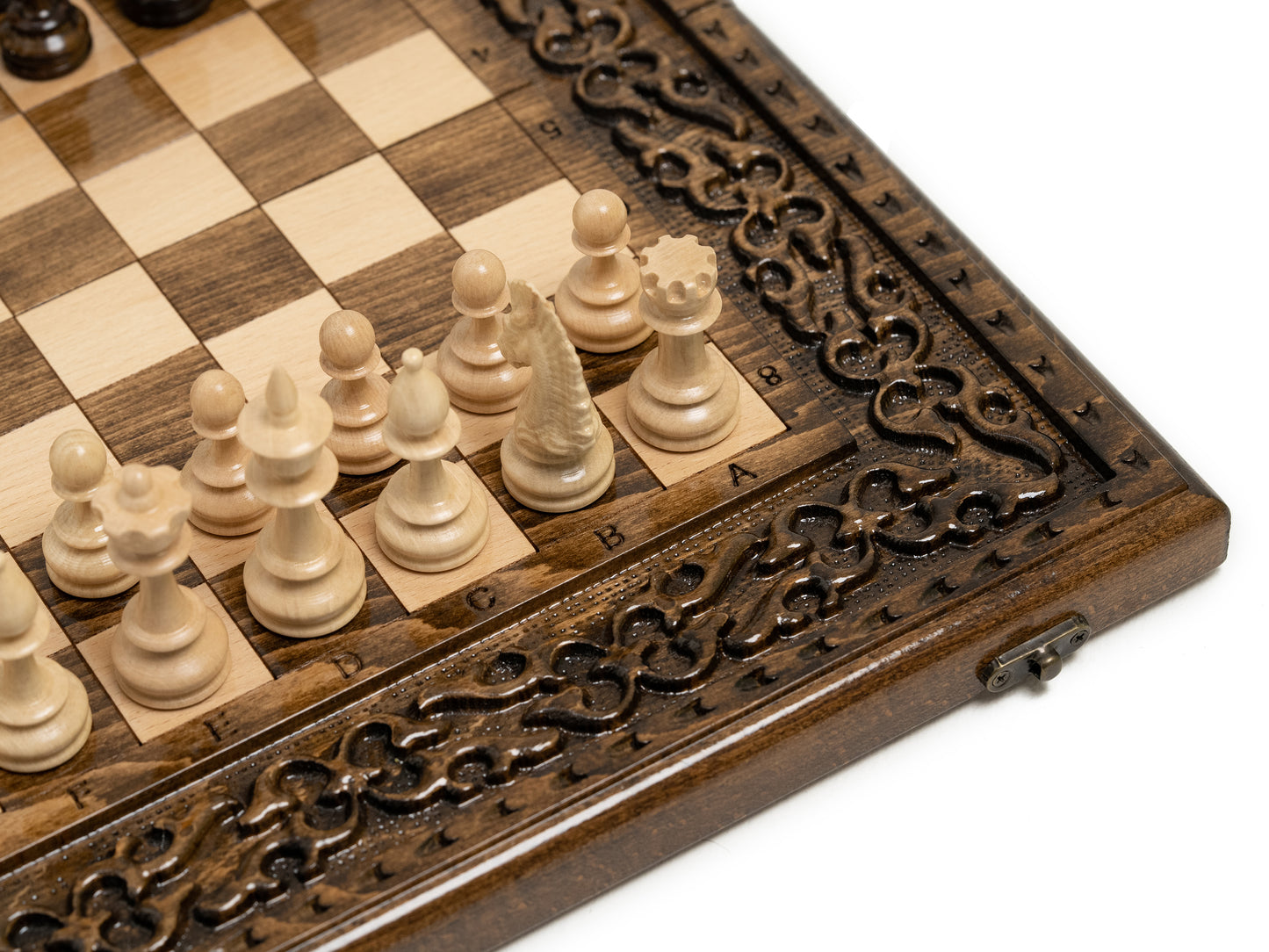 Close-up view of hand-carved wooden chess pieces