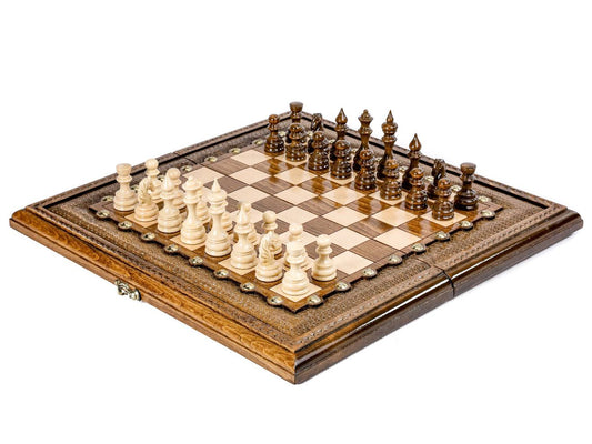Hand-carved luxury wooden chess set with bronze details, showcasing unparalleled craftsmanship and unique design.