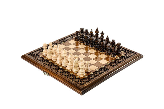 Deluxe chess and backgammon set with elegant bronze details, blending luxury with strategic depth.