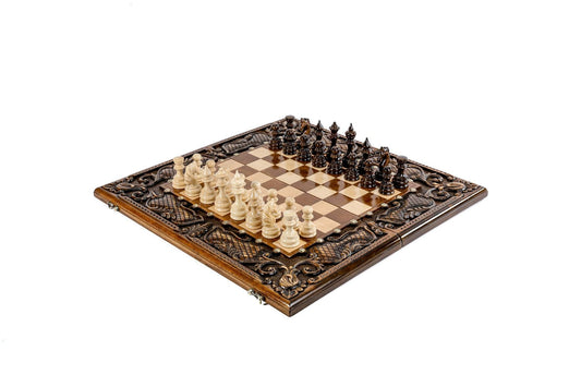 Supreme luxury chess set with hand-carved pieces and elegant bronze details, epitomizing the art of strategy and craftsmanship.