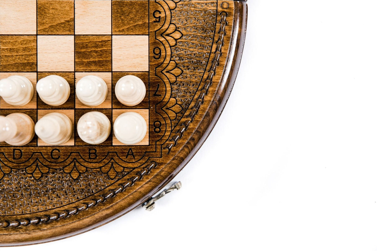 Master the game on a board that reimagines chess, combining the richness of wooden craftsmanship with innovative round design.