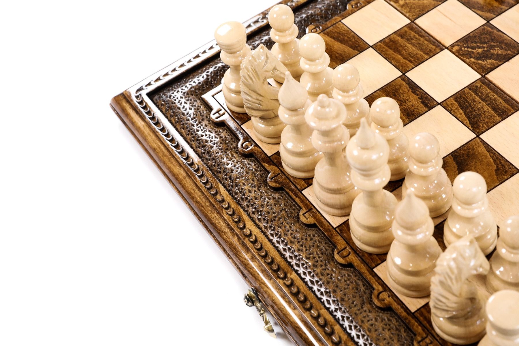 Command the board in style with a handcrafted set that redefines gaming elegance, featuring meticulously carved pieces for chess and backgammon.